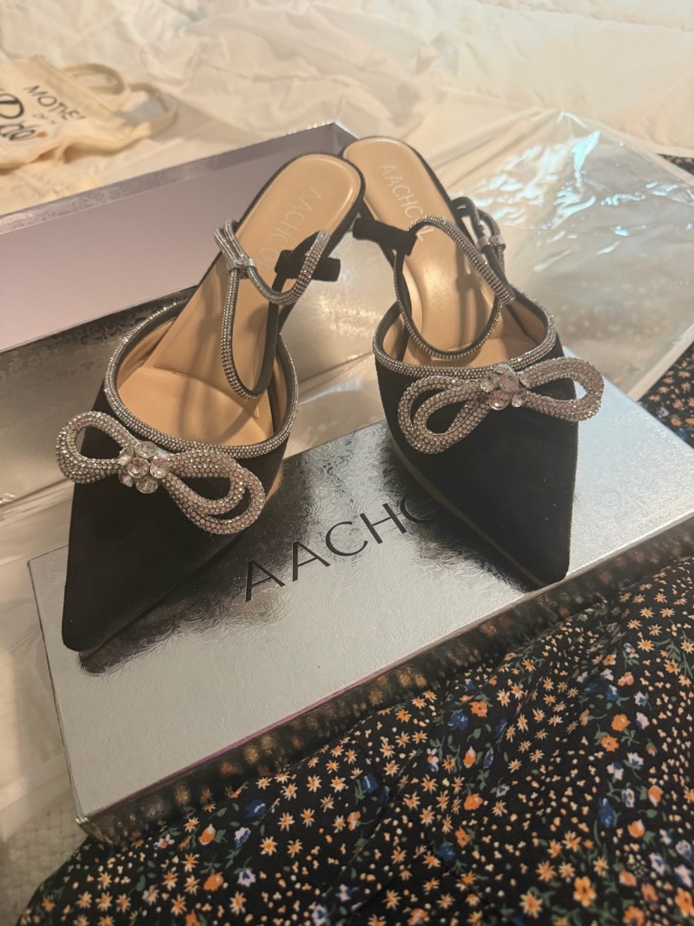 Black Pointed Slingback Heels with Crystal Bow Accent